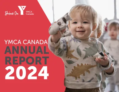 Text: YMCA Canada Annual Report 2024. Image: a little boy is holding and toy and showing it.