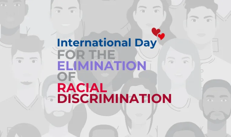 Text: International Day for the Elimination of Racial Discrimination. Image: heads of people in black and white back up the background. There are 2 hearts by the text.