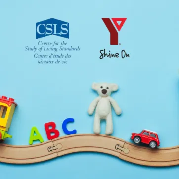 Toys are on top of a wooden train track